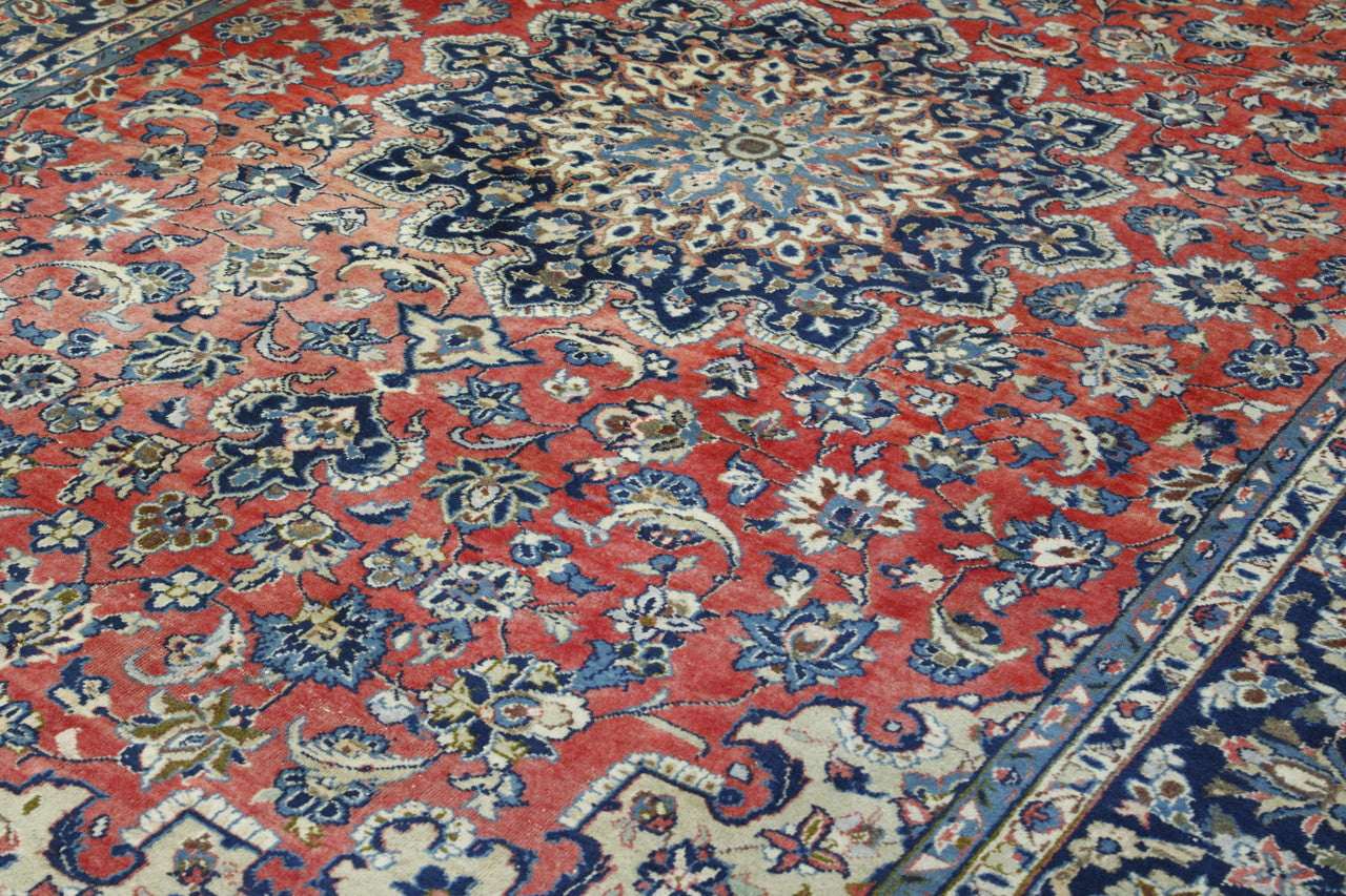 Traditional Antique Tabriz rug corner detail