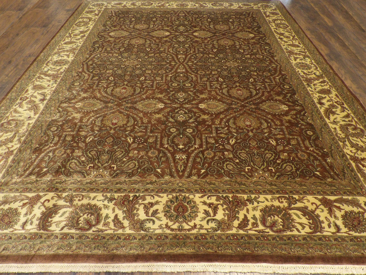 Close-up of wool pile, brown and gold rug