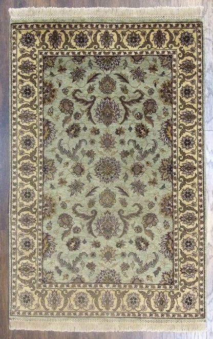 Fine Persian Kashan tie-dye hand-knotted wool rug in gold and green, full view