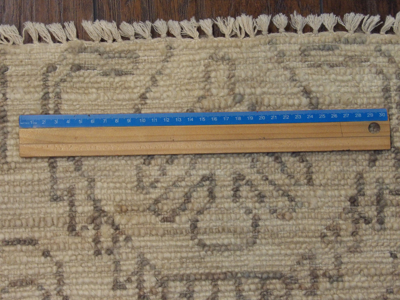 Beige Ikat Oushak Natural Dye Wash rug in room setting