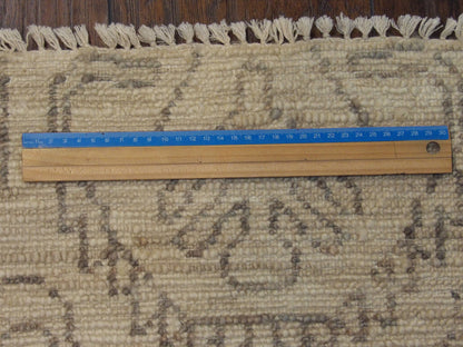 Beige Ikat Oushak Natural Dye Wash rug in room setting
