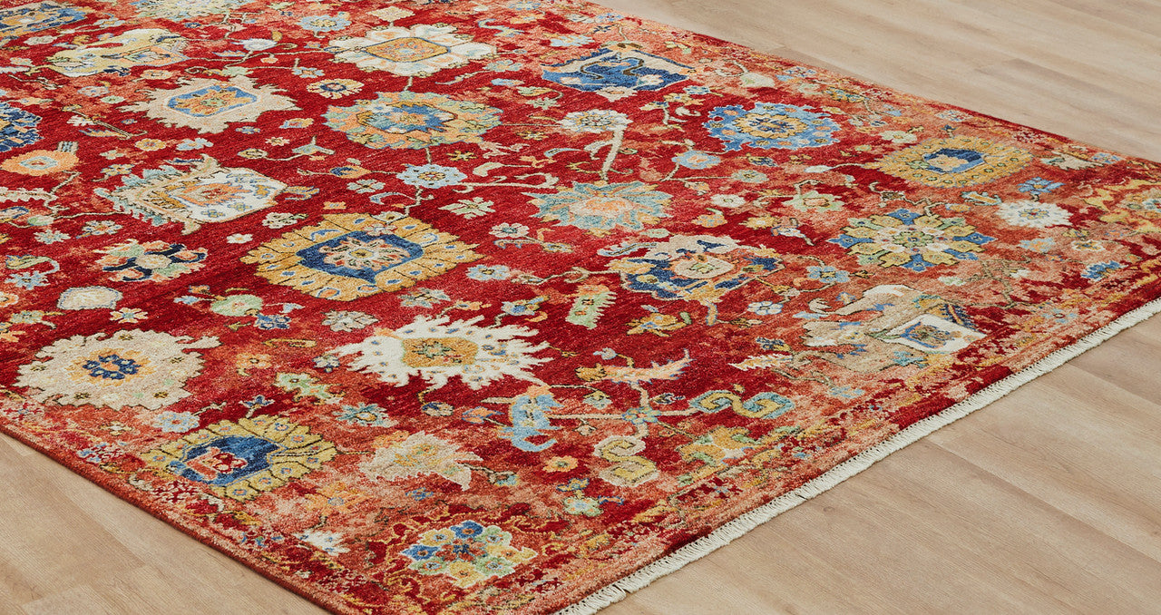 Transitional wool rug in red and gold, detail view