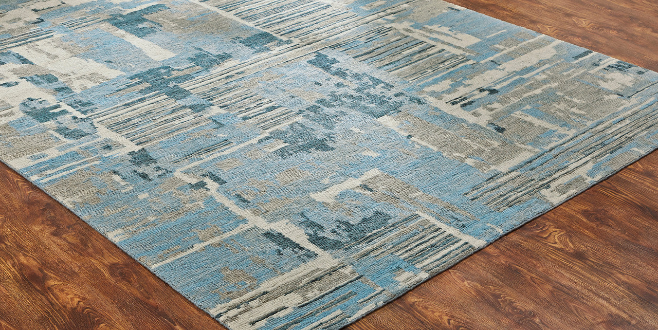 Blue and gray transitional wool rug in room setting