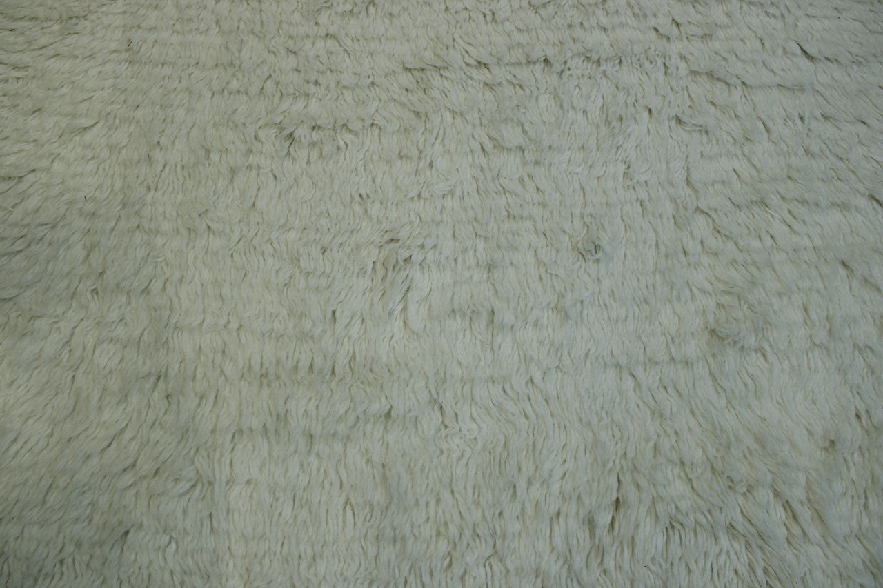 Close-up of wool pile, White rug