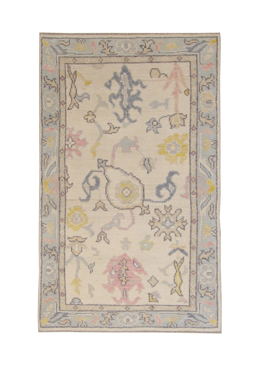 Oushak Chobi hand-knotted wool rug in Green & Beige, full view