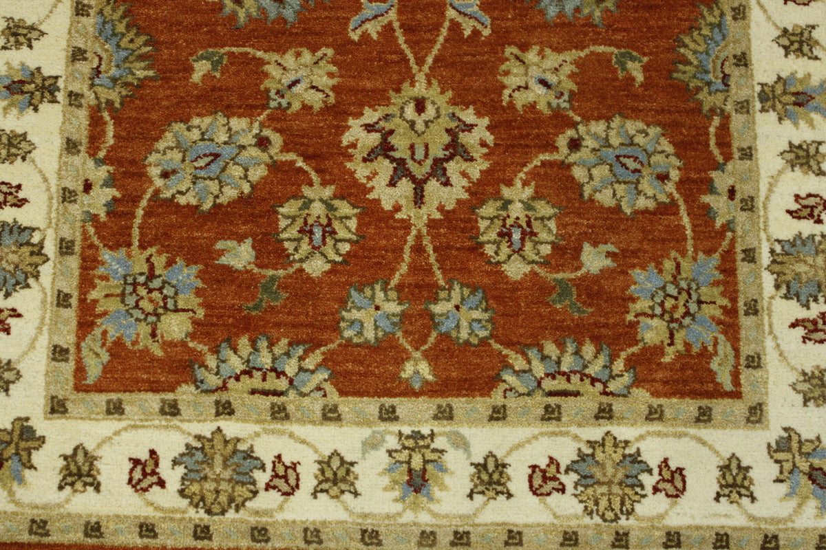 Beige & Rust Oushak Agra Chobi rug in room setting