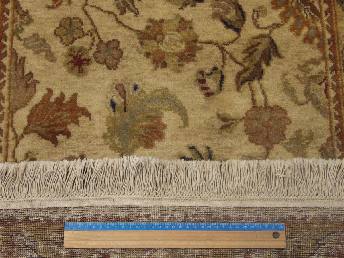 Green & Beige Fine Jaipur Kashan Tie Dye rug in room setting