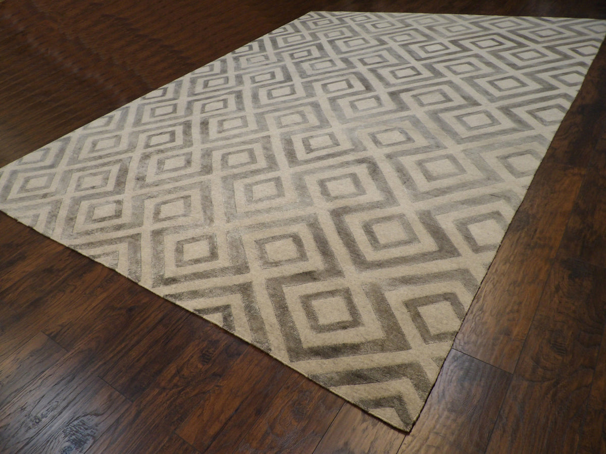 Blue and gray diamond rug in room setting