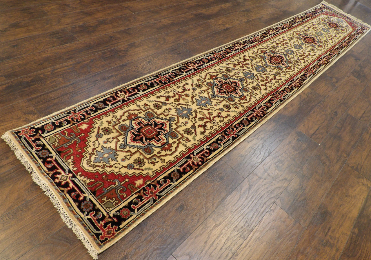 Beige Heriz runner in a hallway setting