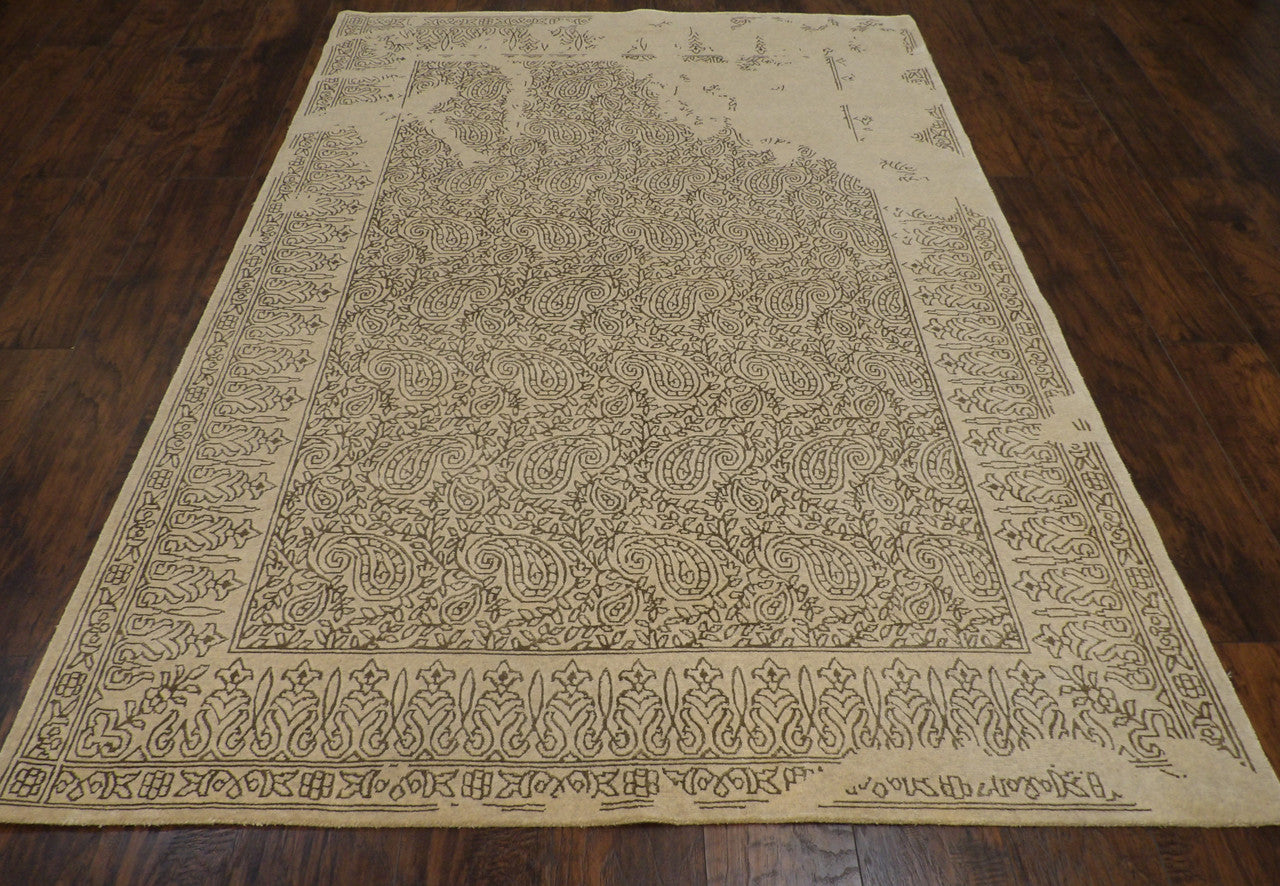 Close-up of wool-silk pile, green and gray rug