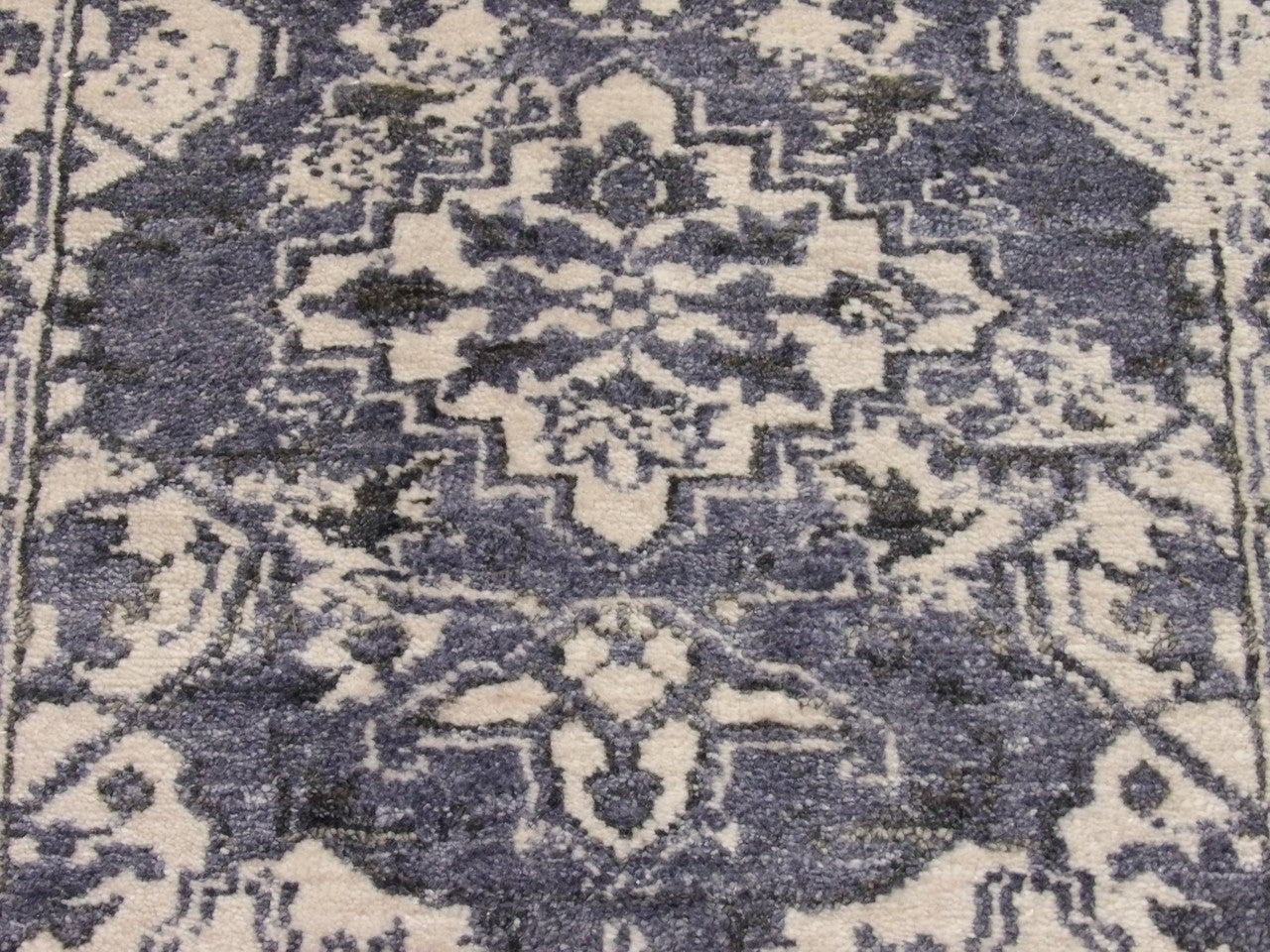 Back of Oushak hand-knotted rug