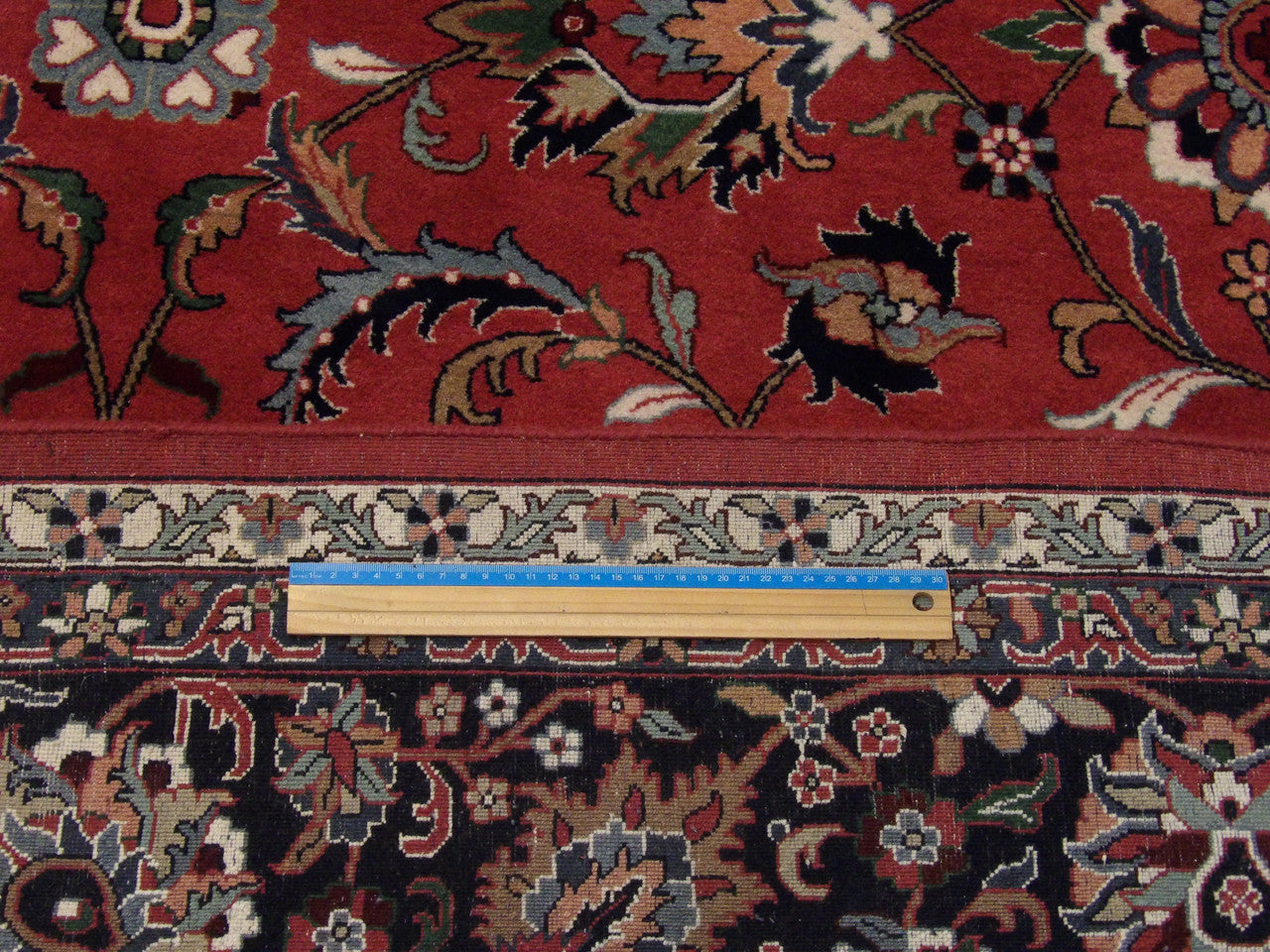 Blue & Red Fine Persian Kashan rug in room setting