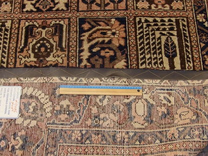Full room view of antique Persian Bakhtiyari rug