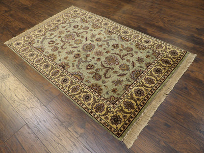 Gold Kashan rug in a room setting
