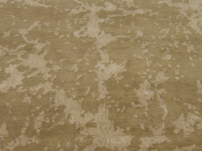 Broken damask rug edge detail, beige and gray