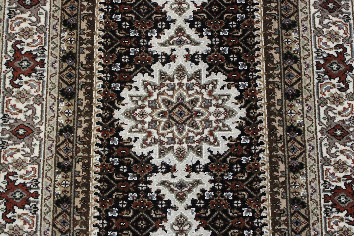 Traditional Qum Design rug corner detail