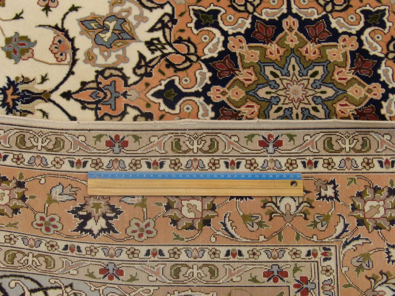 Beige & Pink Fine Persian Qum rug in room setting