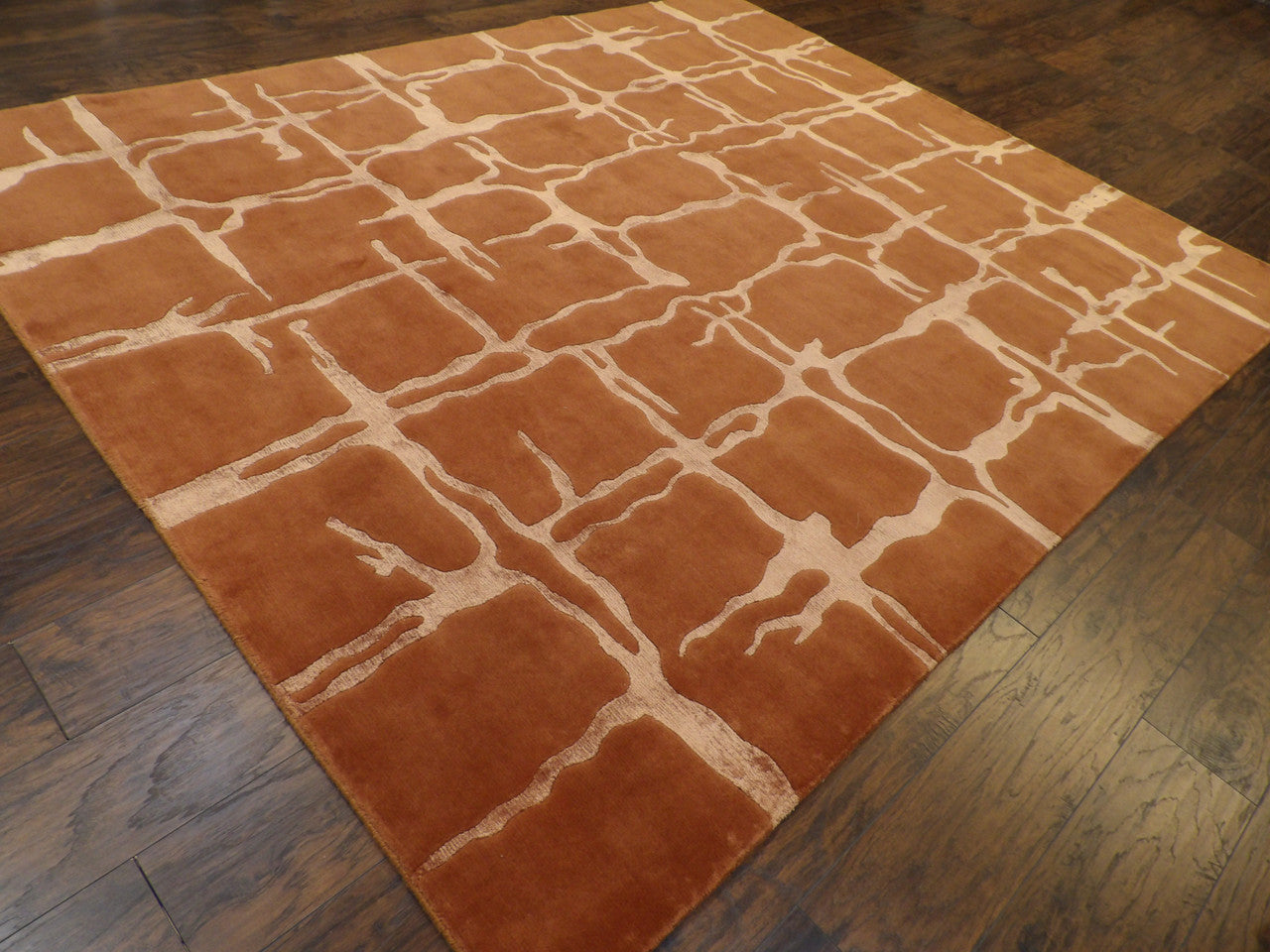 Wave pattern detail, rust rug