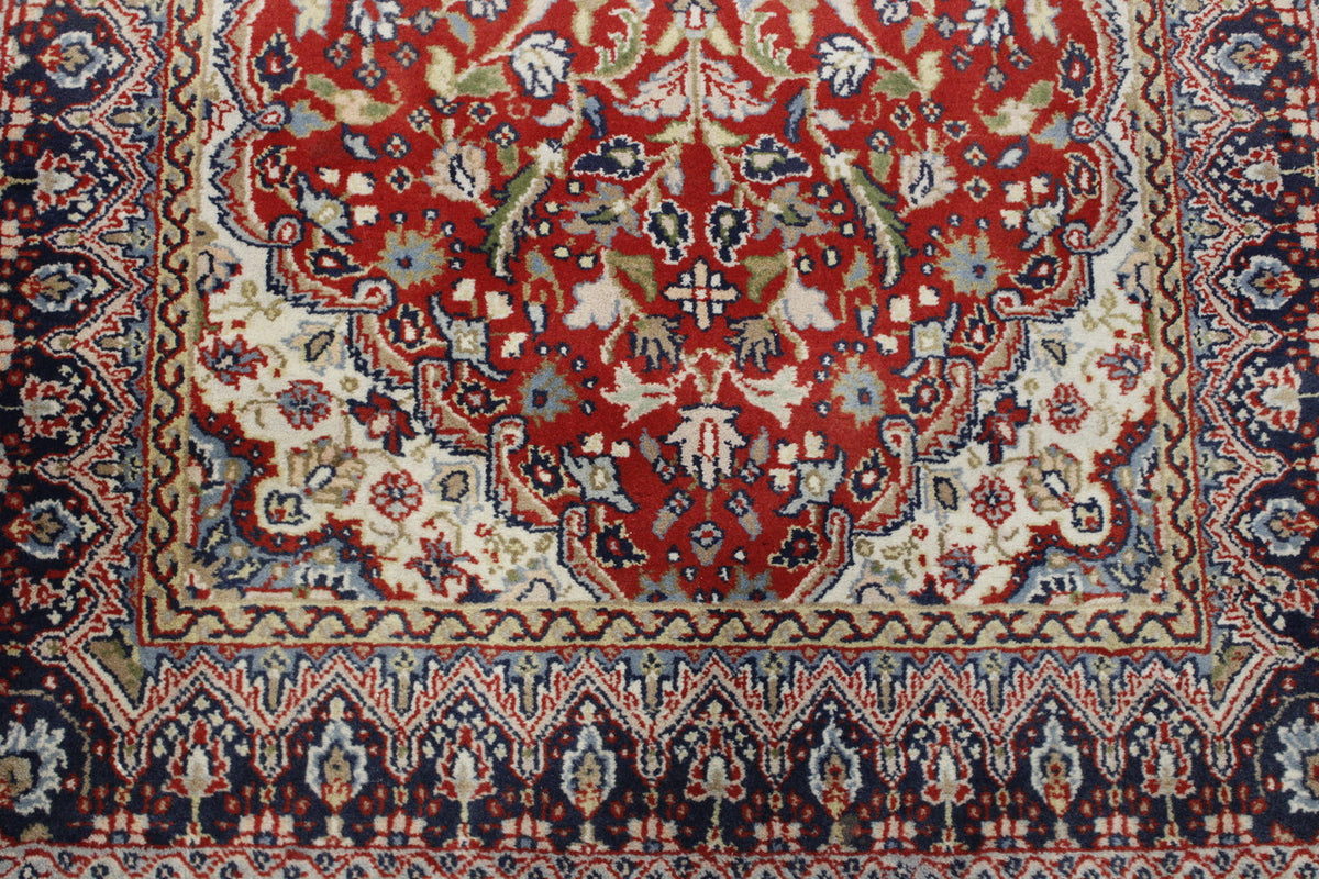 Traditional Tabriz Design rug corner detail