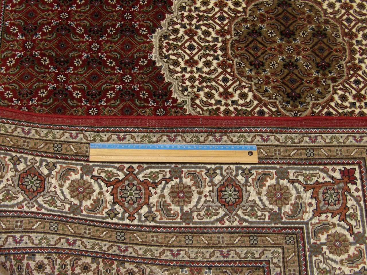 Full room view of fine Persian Mahi Tabriz hand-knotted rug