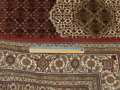 Full room view of fine Persian Mahi Tabriz hand-knotted rug