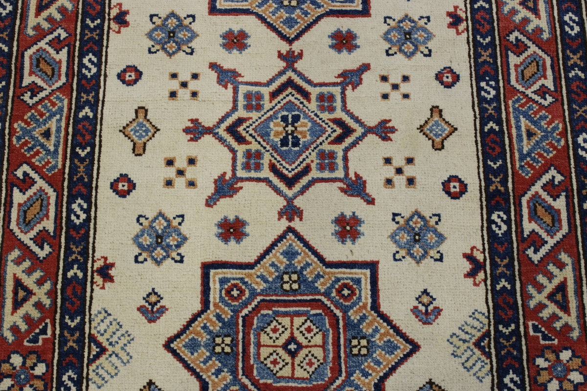 Tribal Super Kazak rug corner detail