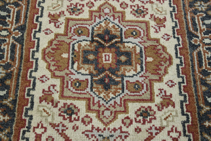 Tribal Heriz rug corner detail
