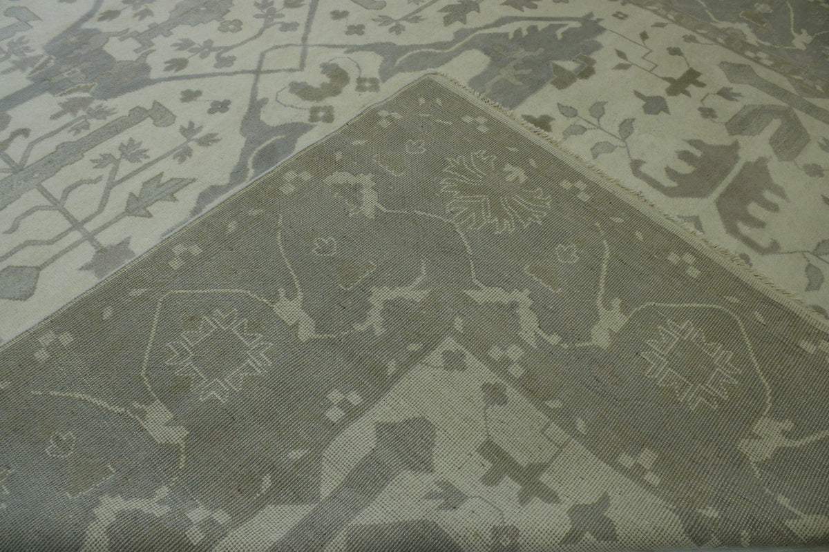 Beige Oushak Ziegler rug in room setting