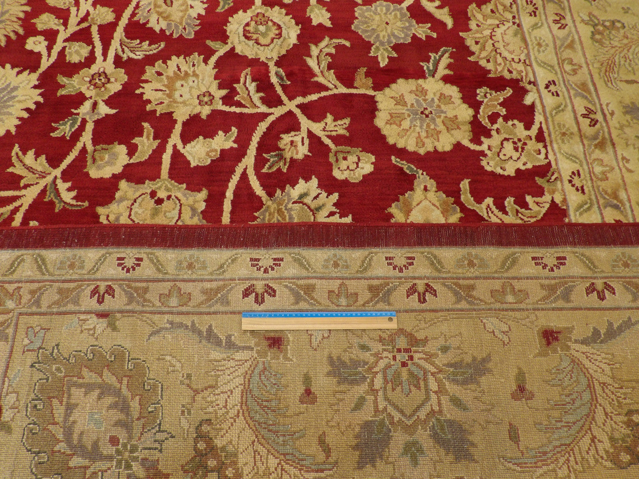 Gold and red Ziegler rug in room setting