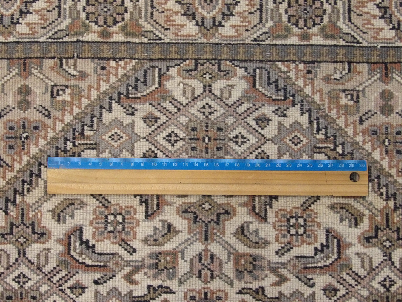 Ivory Fine Persian Mir Herati rug in room setting
