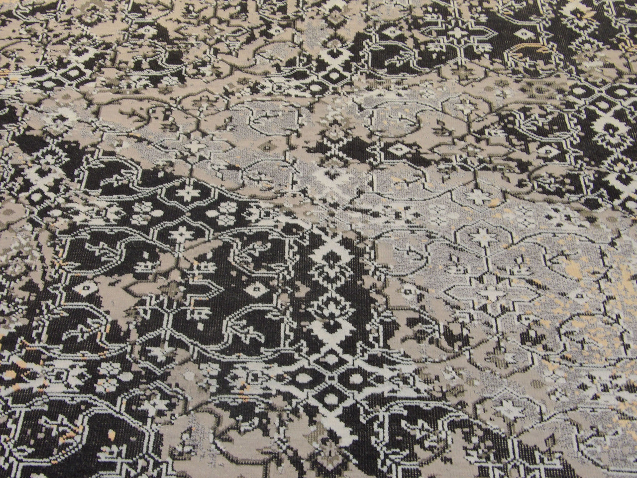 Wool-silk texture close-up, black oxidized vintage rug