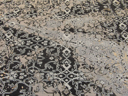 Wool-silk texture close-up, black oxidized vintage rug