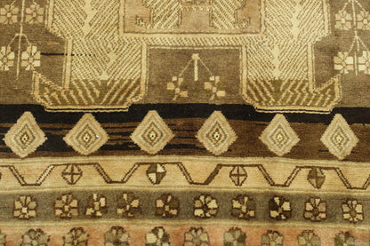 Brown & Pink Tribal Antique Hamadan rug in room setting