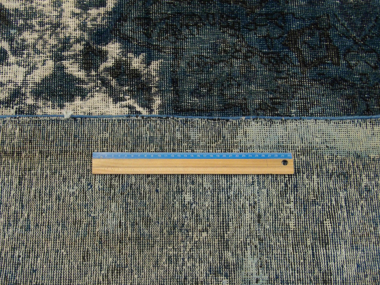 Teal overdye rug in room setting