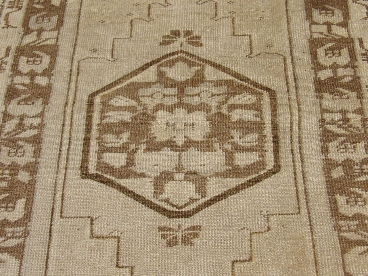 Back of vintage hand-knotted rug