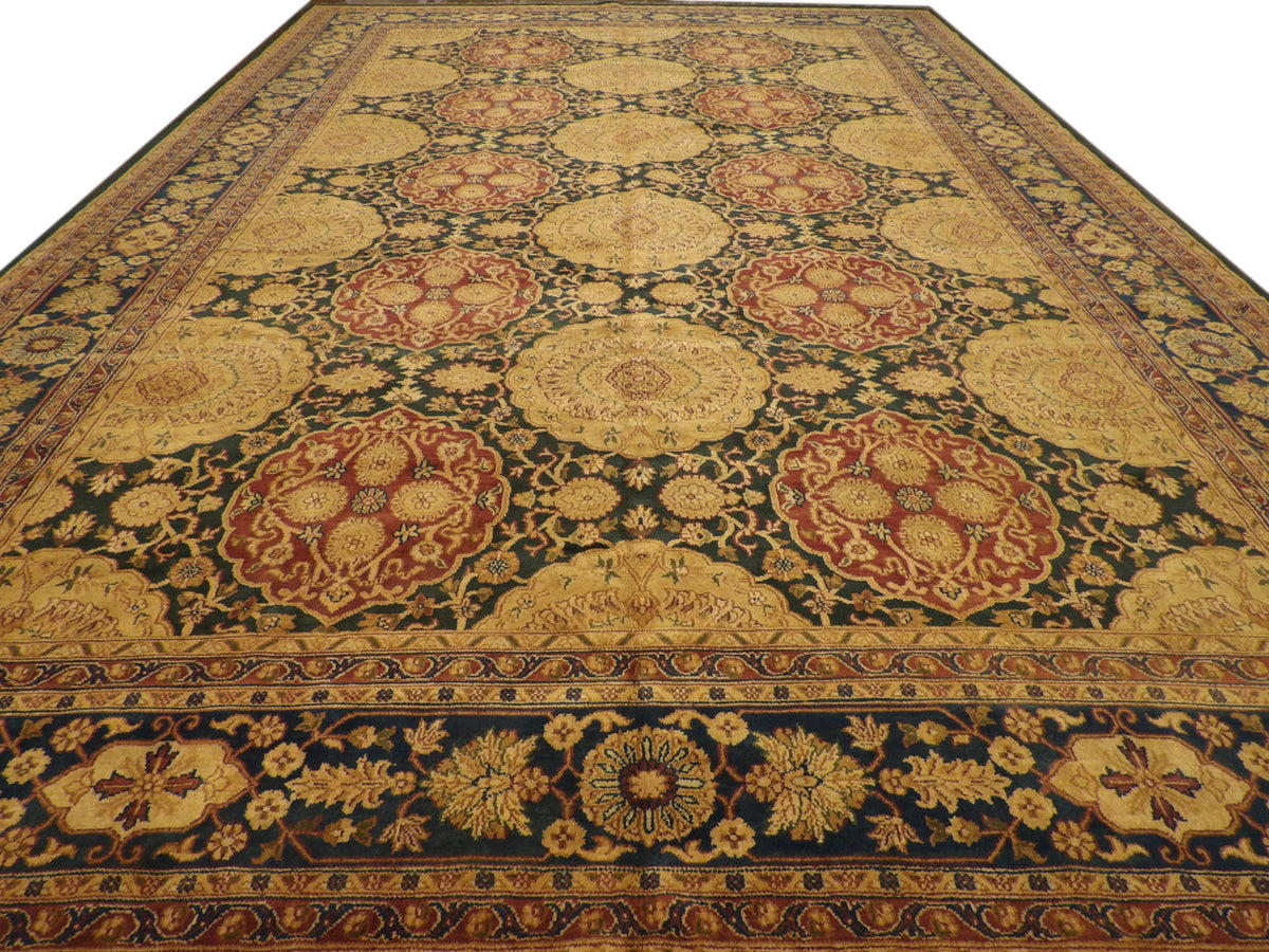 Close-up of antique wash wool pile, green rug