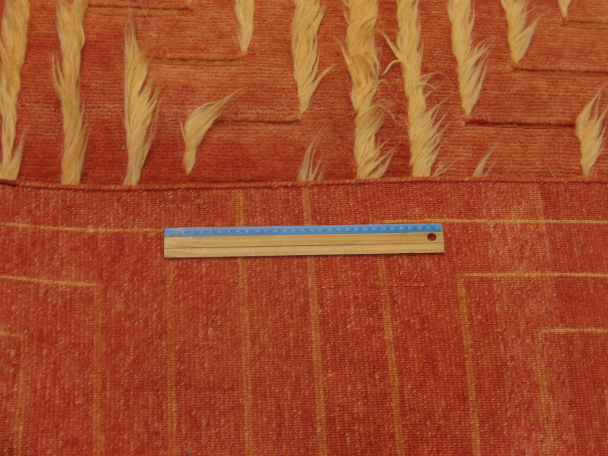 Full room view of modern high-low shag hand-knotted rug