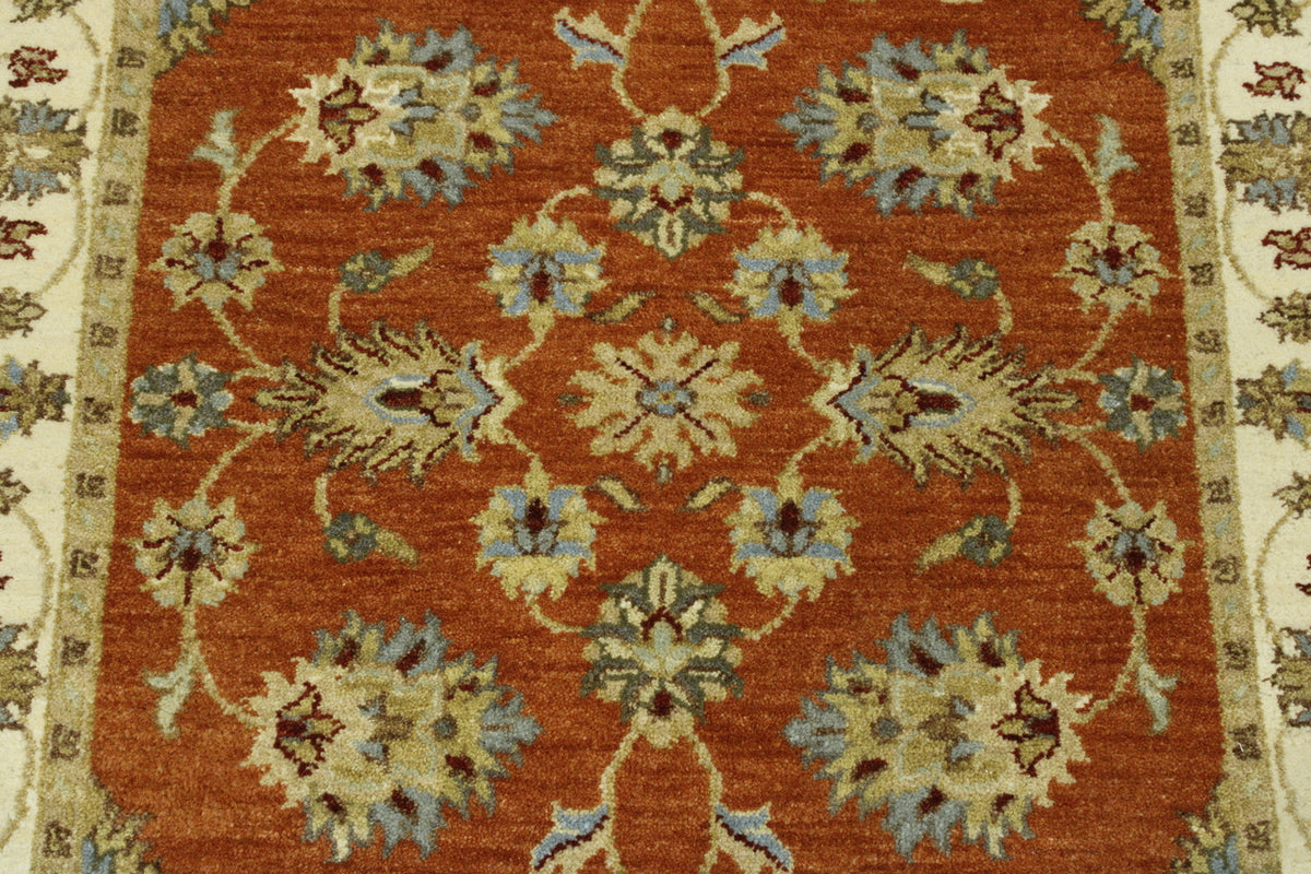Beige & Rust Oushak Agra Chobi rug in room setting