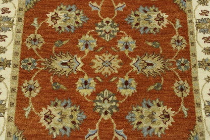 Beige & Rust Oushak Agra Chobi rug in room setting