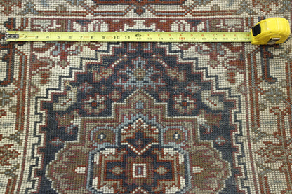 Tribal Heriz hand-knotted wool rug in Blue & Beige, full view
