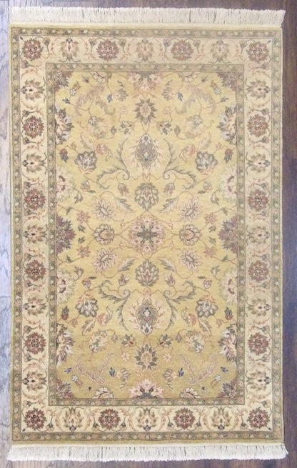 Fine Persian Kashan tie-dye hand-knotted wool rug in gold and ivory, full view