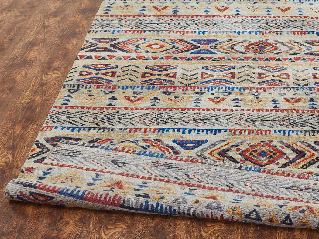 Beige transitional wool rug in room setting