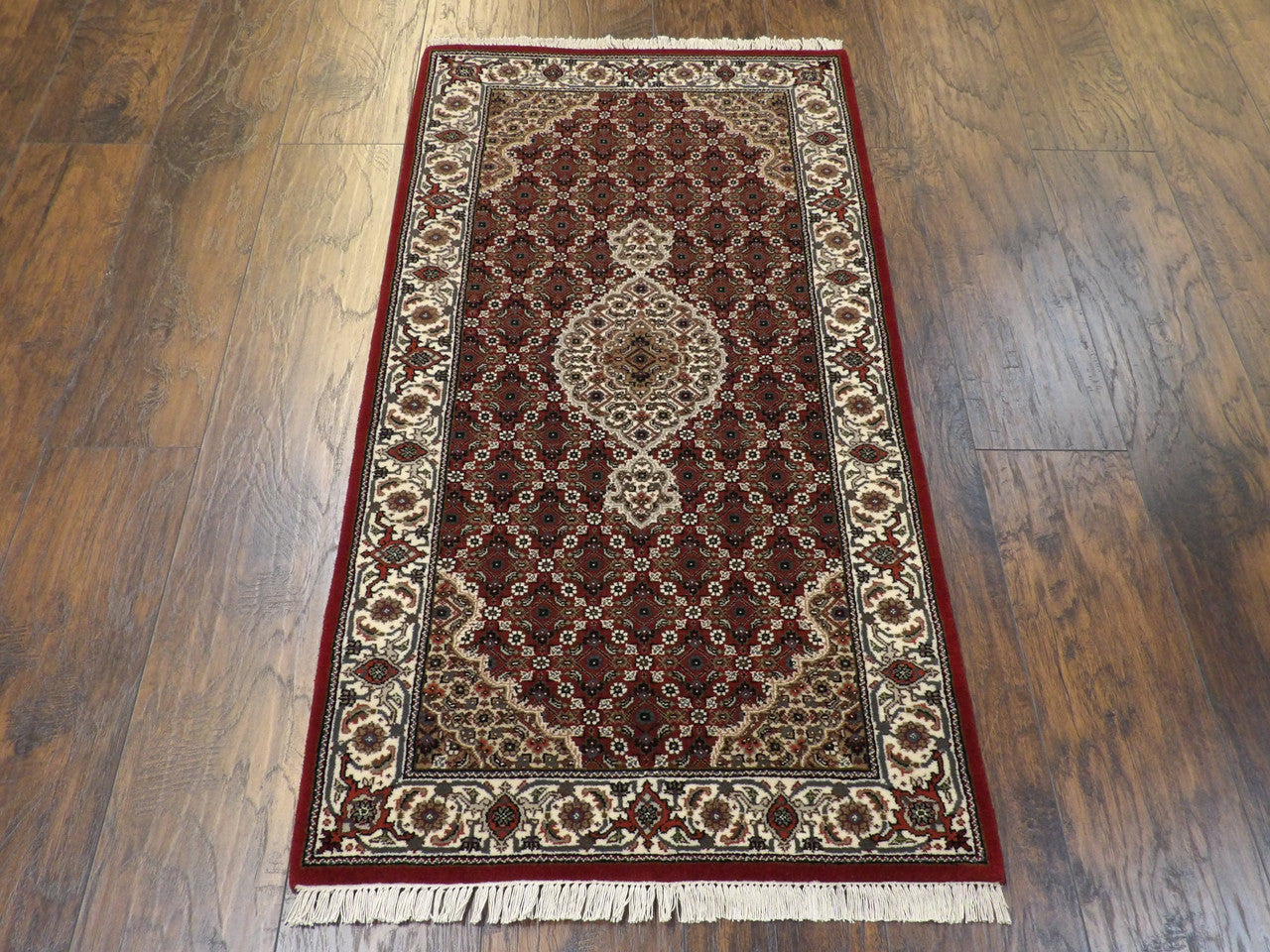 Fine Persian Tabriz rug corner detail