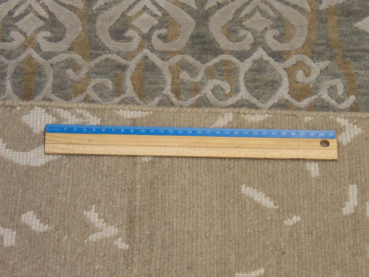 Full view of modern broken design hand-knotted rug