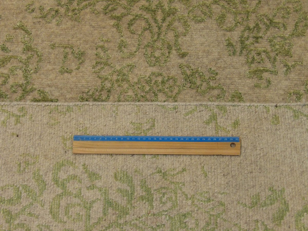 Full room view of transitional broken design hand-knotted rug