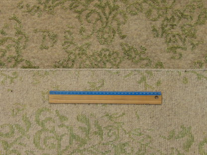 Full room view of transitional broken design hand-knotted rug