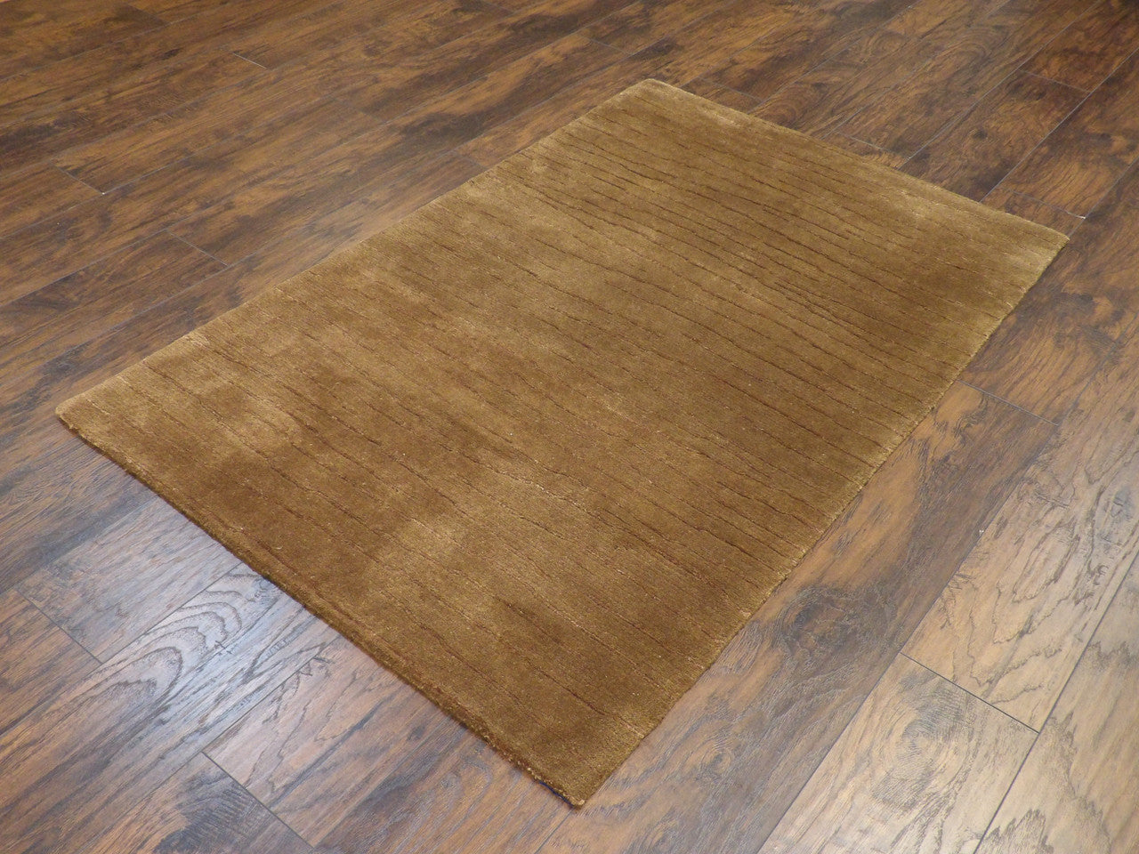 Modern plain field detail, brown rug