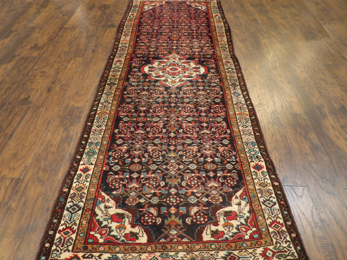 Antique Persian Hamadan rug corner detail