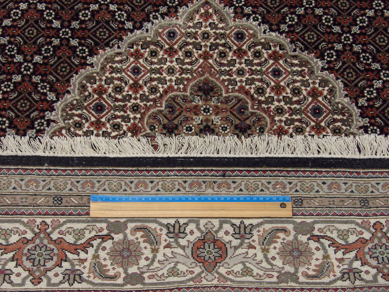 Black & Beige Fine Persian Mahi Tabriz rug in room setting