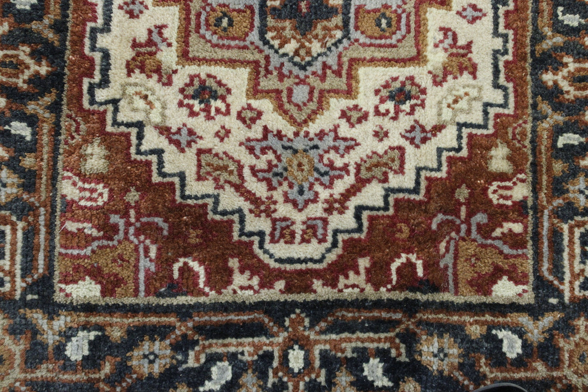 Black & Beige Tribal Heriz rug in room setting